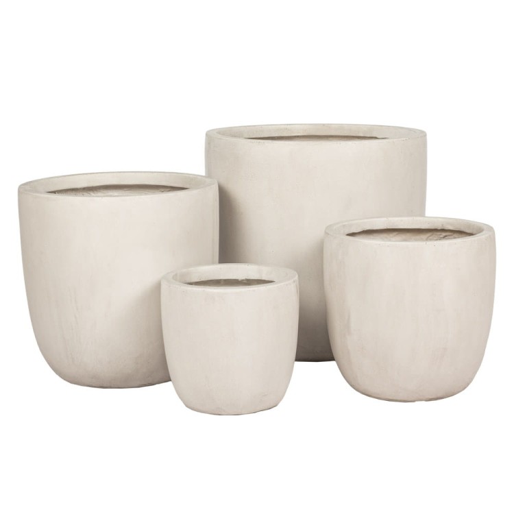 Biała donica ogrodowa ceramiczna.